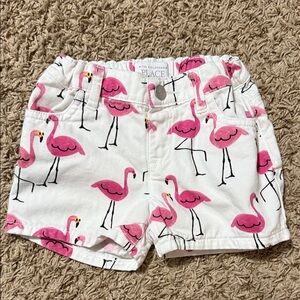 3t girls white shorts with pink flamingos throughout.